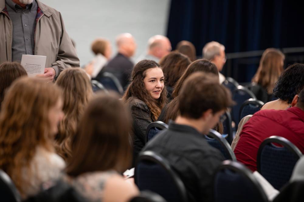Students are seated and waiting for the ceremony to commence